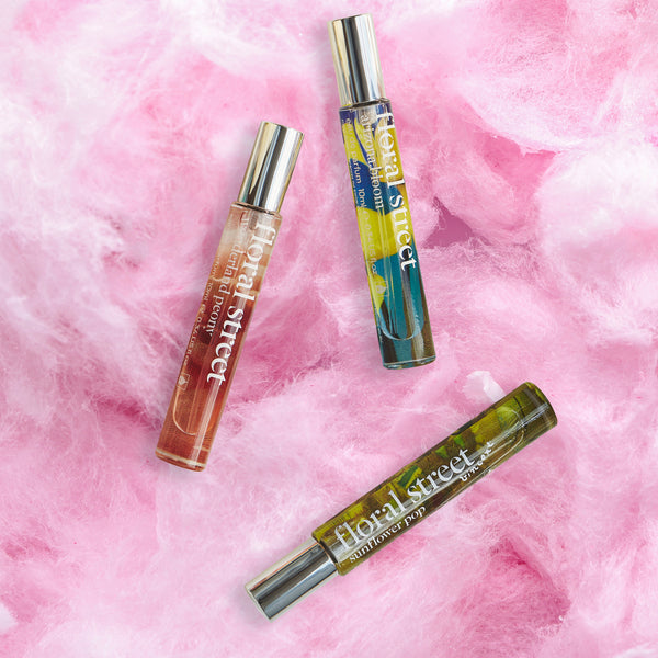 Floral Street bestselling travel size fragrances on pink cotton candy